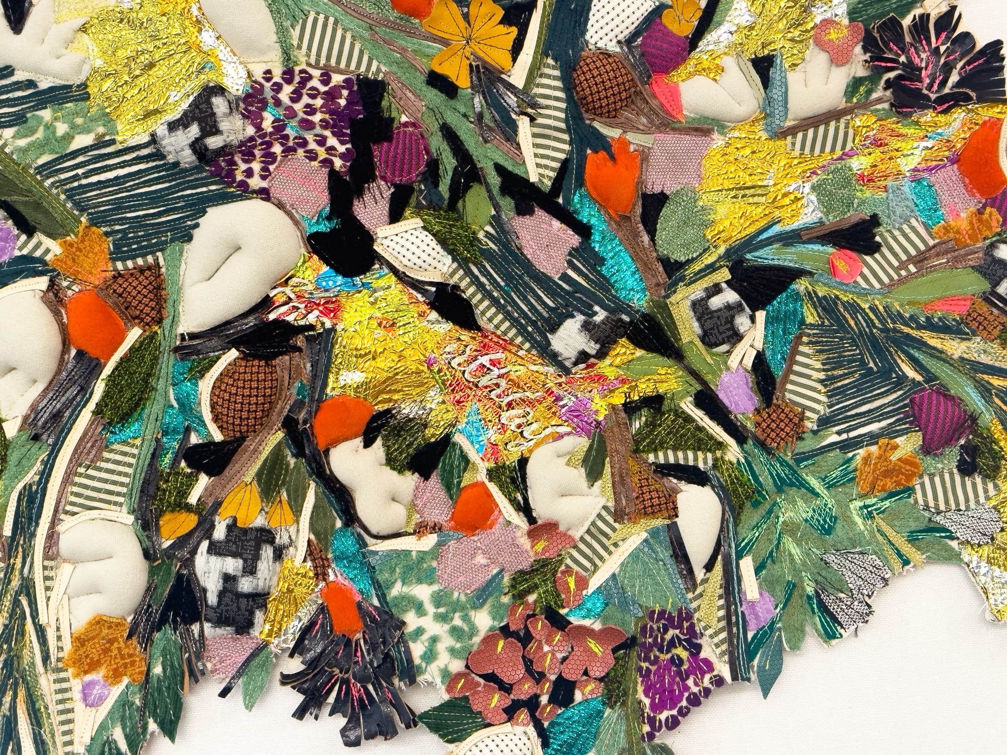detail of a floral like display made of colorful textiles