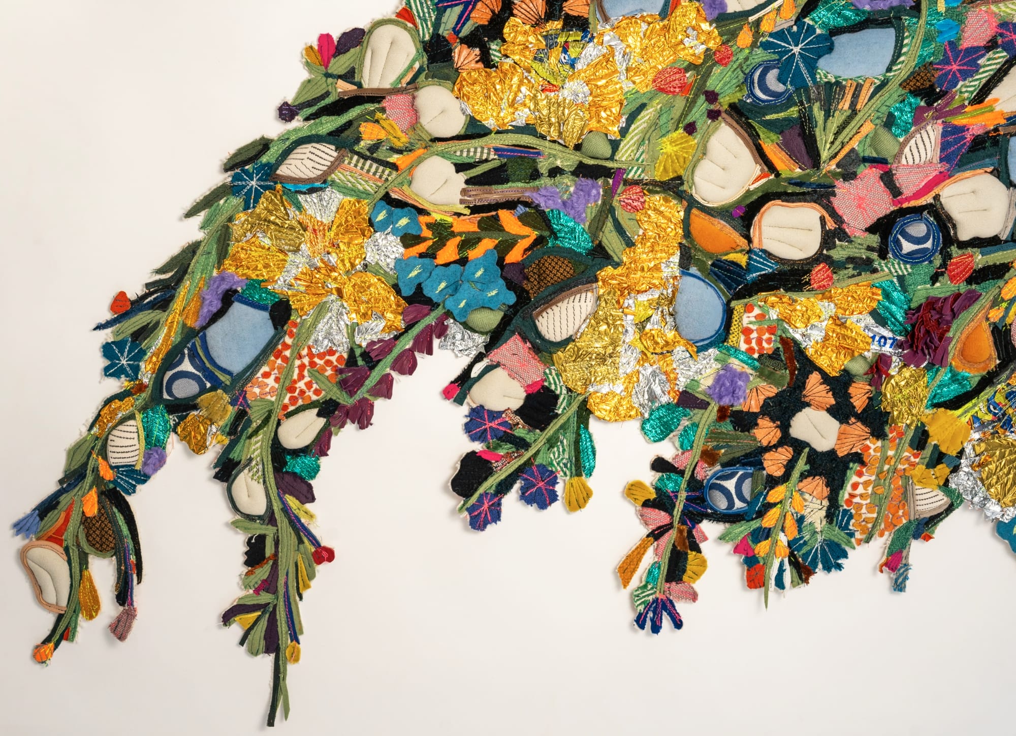 detail of a floral like display made of colorful textiles