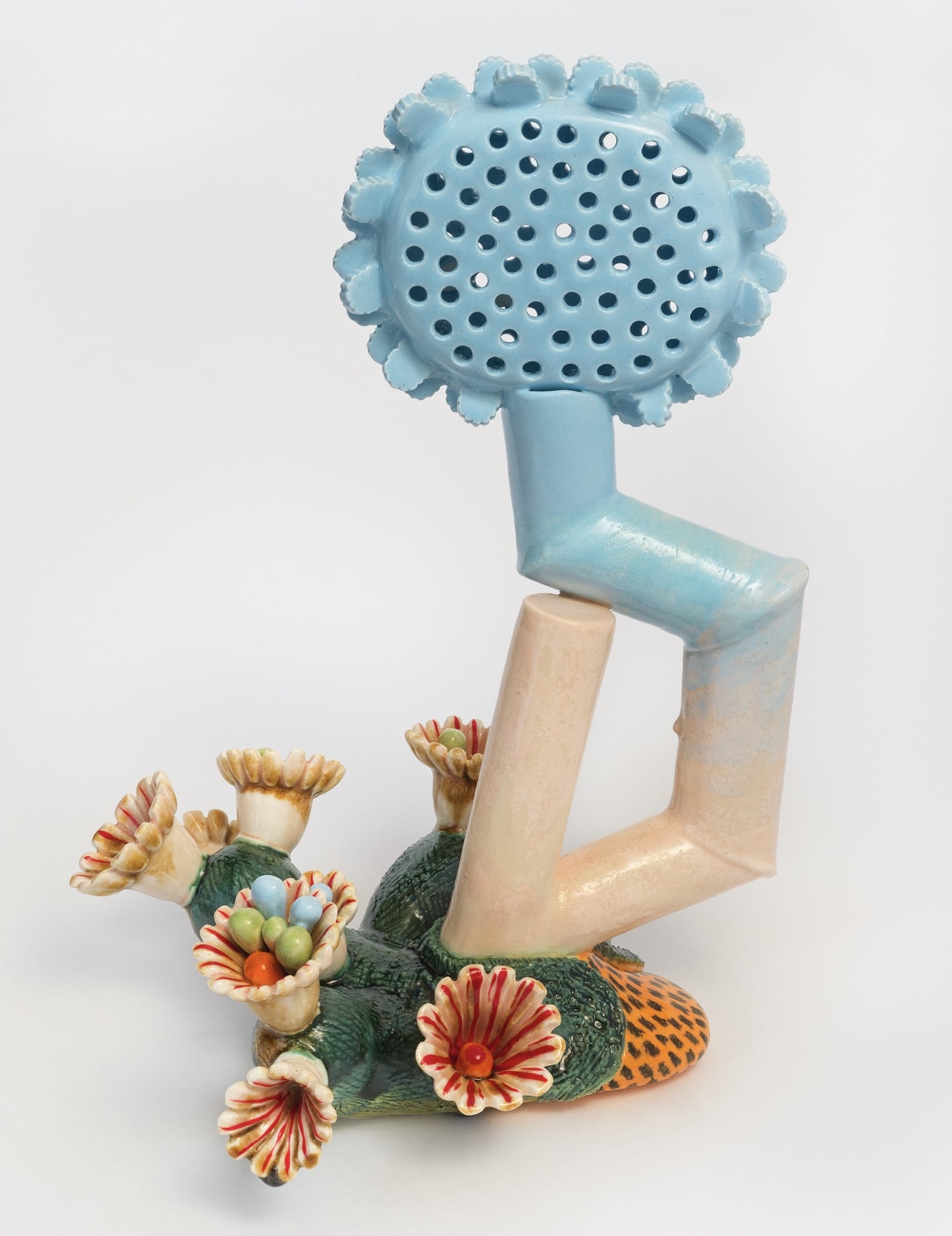 a ceramic sculpture by Megan Bogonovich resembling an abstract, otherworldly plant or flower